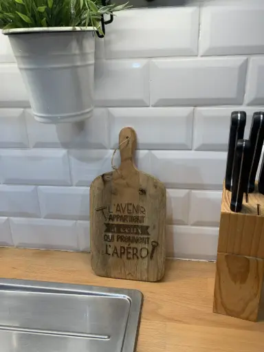 Planche à découper "L'avenir appartient ..."